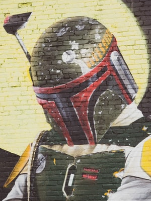 Image of graffiti depicting Boba Fett looking down.