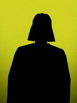 A sithouette of Darth Vader with a yellow background