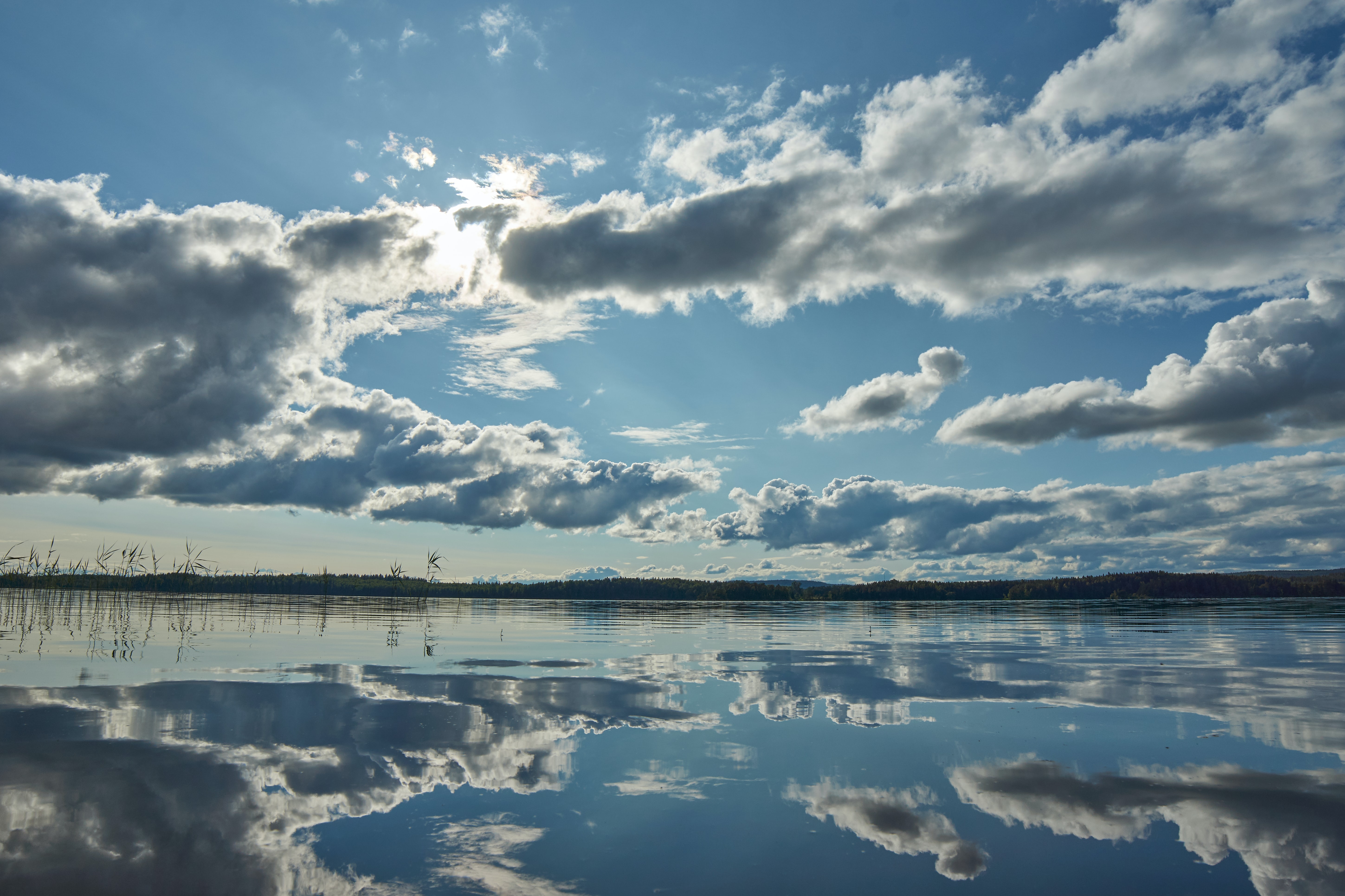 Picture of cloudy sky above a river.
